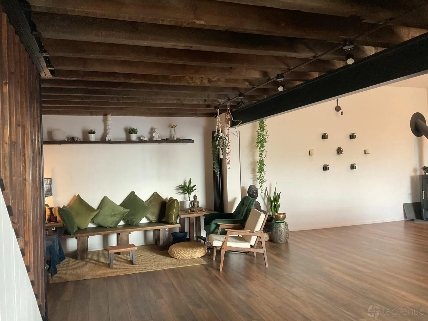 Relaxed seating beneath the timber mezzanine