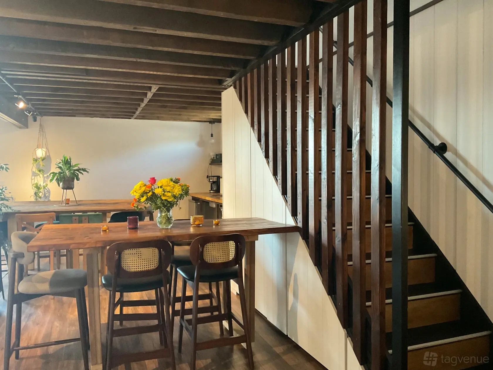 Dining area beside the mezzanine staircase